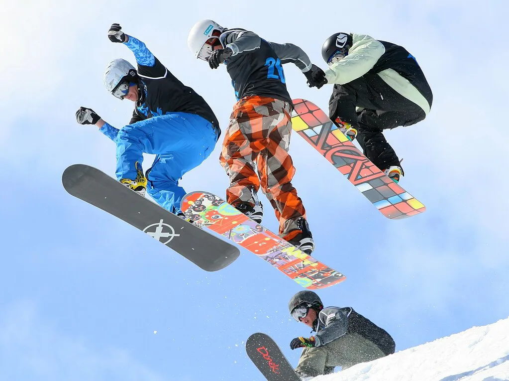 Getting air off the Wu-Tang in the Men's Snowboard Boardercross Finals - The Brits, Laax